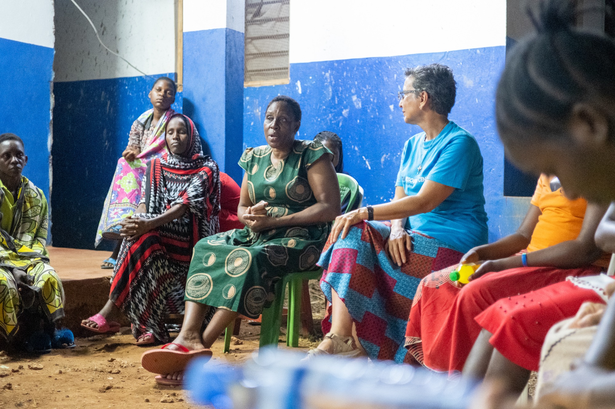 Madame Lucy telling the story of how she started Heri Sewing College